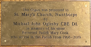 Dedication plate to Rev'd Judy Cook